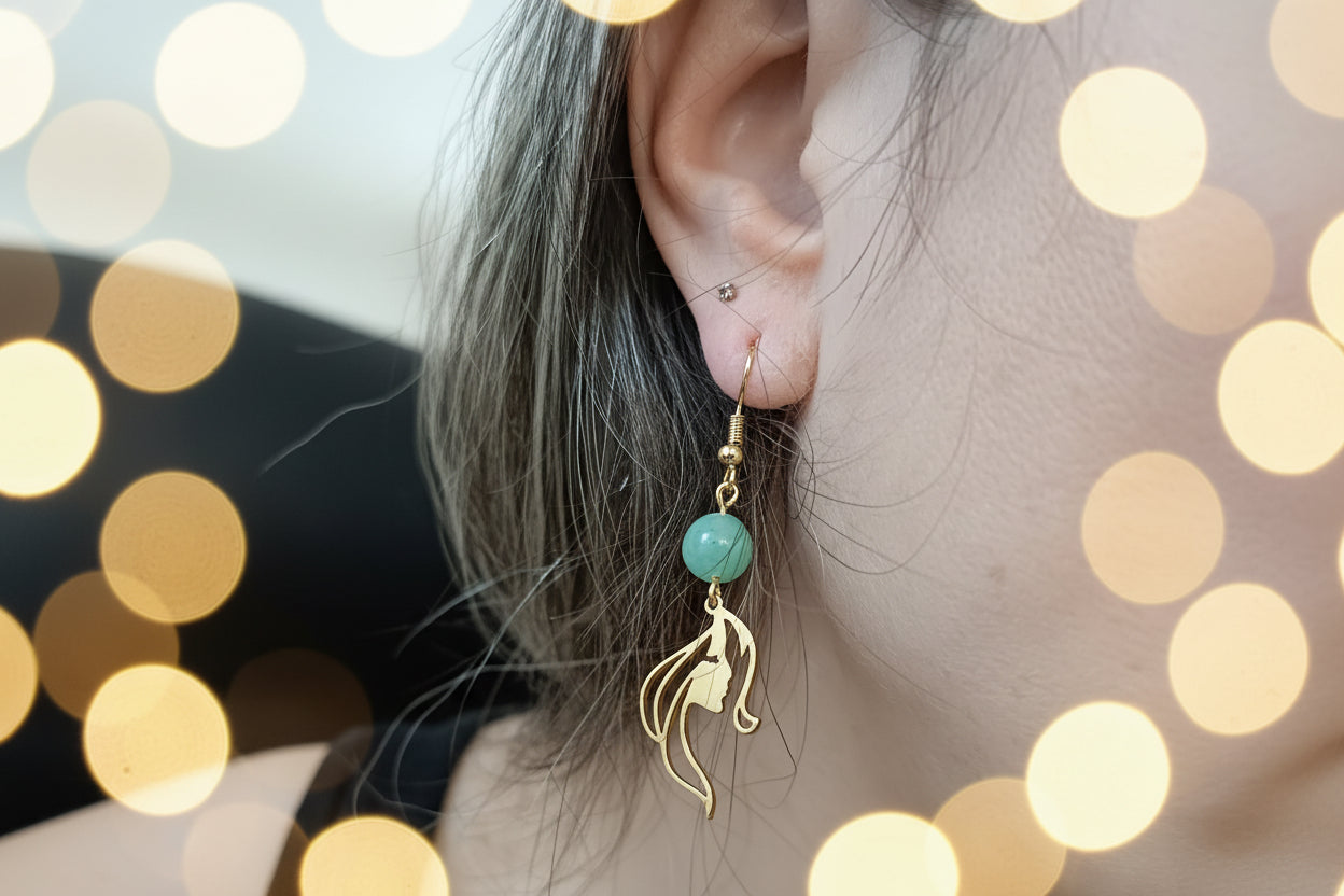 boucles d’oreilles visage, pendentif visage, acier inoxydable hypoallergénique, bijou jade, bijou corail, boucles d’oreilles doré, boucles d’oreilles argenté, bijoux légers, bijou artistique, accessoire femme, style élégant, cadeau femme, bijou quotidien, tendance 2026, bijou minimaliste, bijou visage