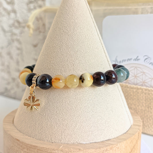 bracelet pierres naturelles ambre grenat émeraude trefles aurore de cristal 